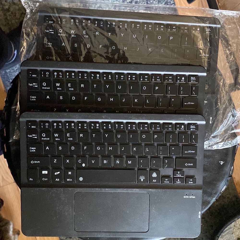Multi function keyboard with touchpad